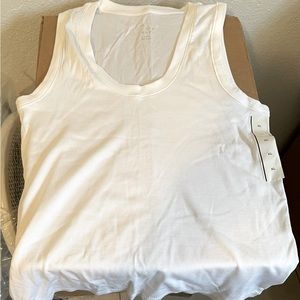 Plain white tanks from Target brand “A New Day”. All shirts are NWT.